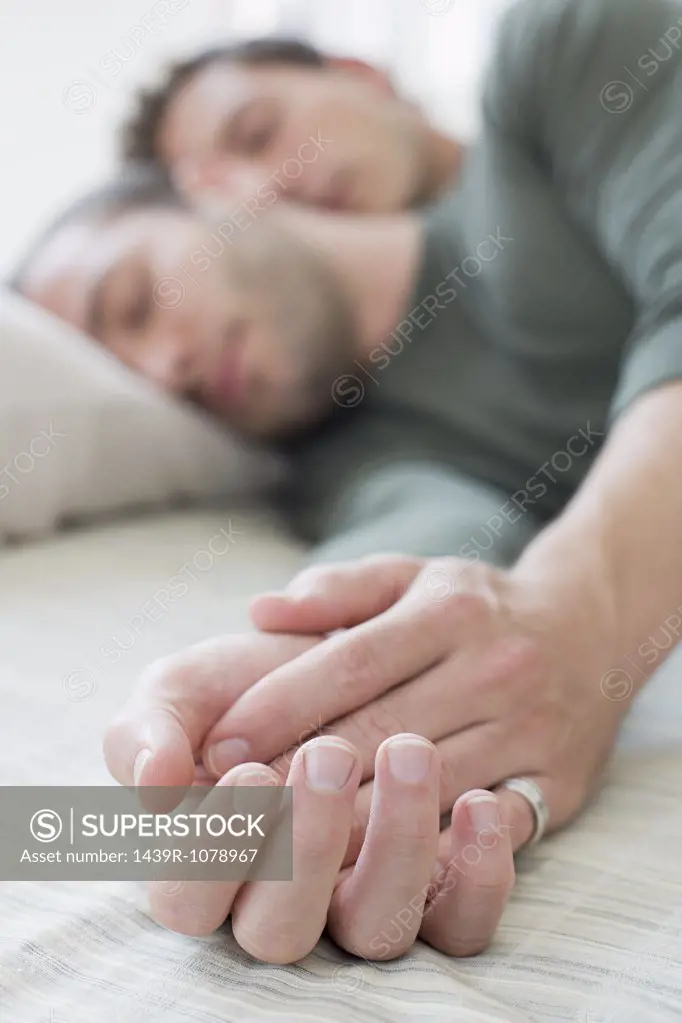 Gay couple sleeping