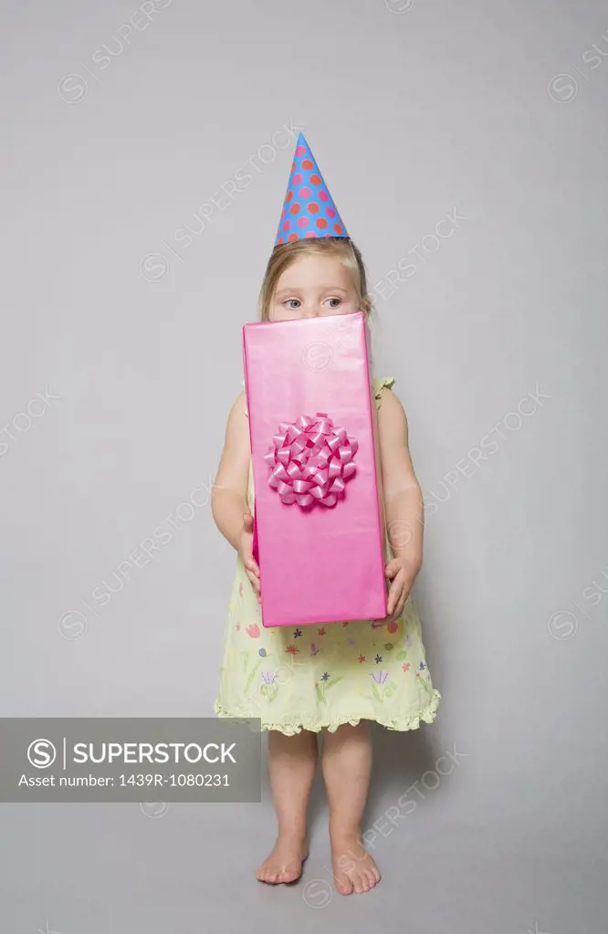 Girl holding a gift