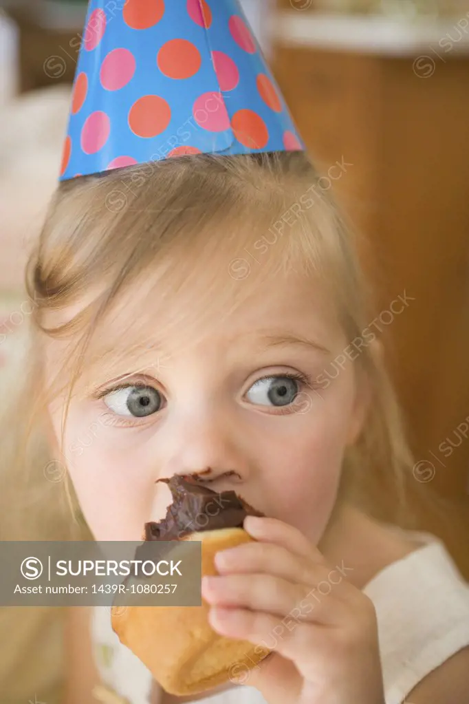 Little girl with a cupcake