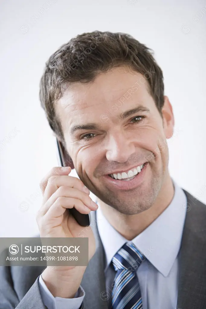 Portrait of a businessman using a cell phone