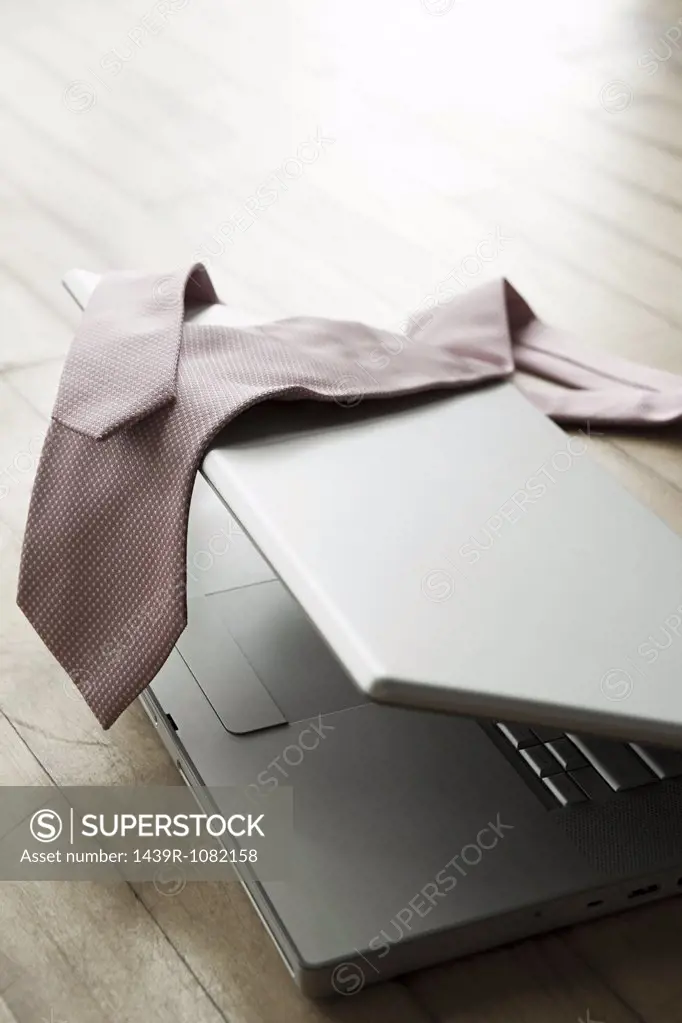 A tie on a laptop