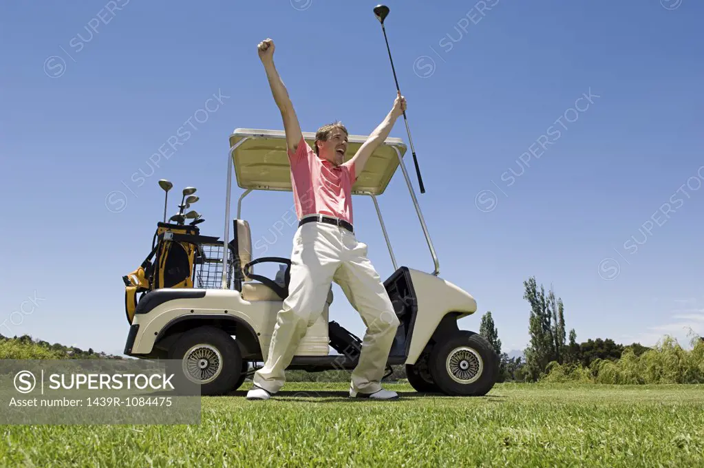 A golfer cheering