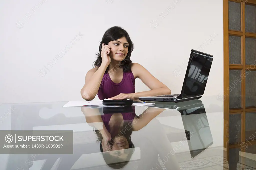 A woman sorting out her finances