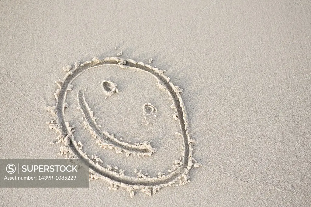 Smiley face in the sand