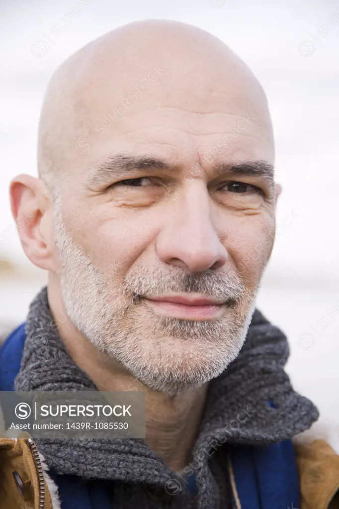 Headshot of a bald man