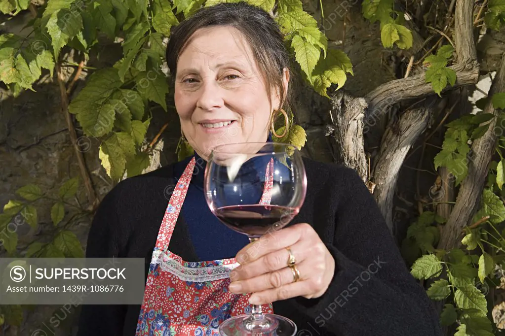 Italian woman drinking red wine