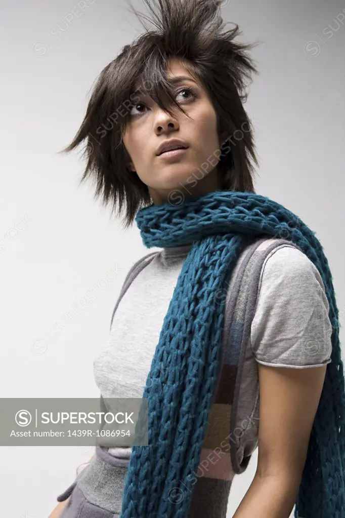 Young woman wearing a scarf