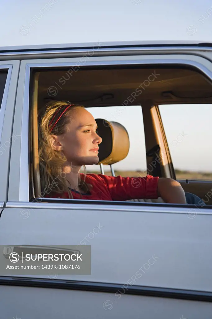 A woman in a car