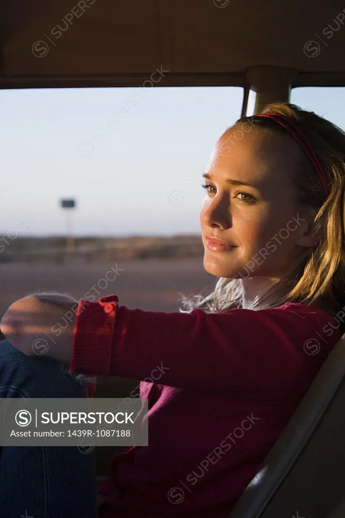 A woman in a car