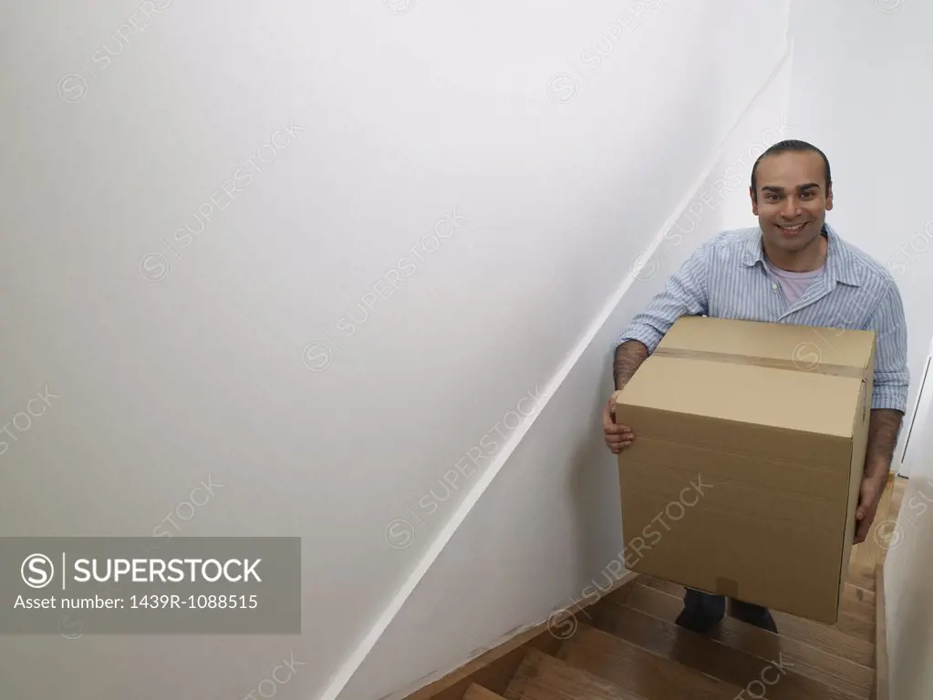 A man carrying a box