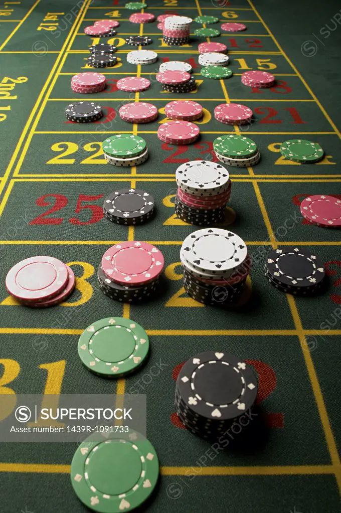 Gambling chips on a roulette table