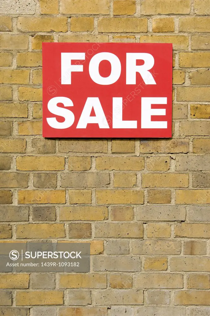 For sale sign on wall