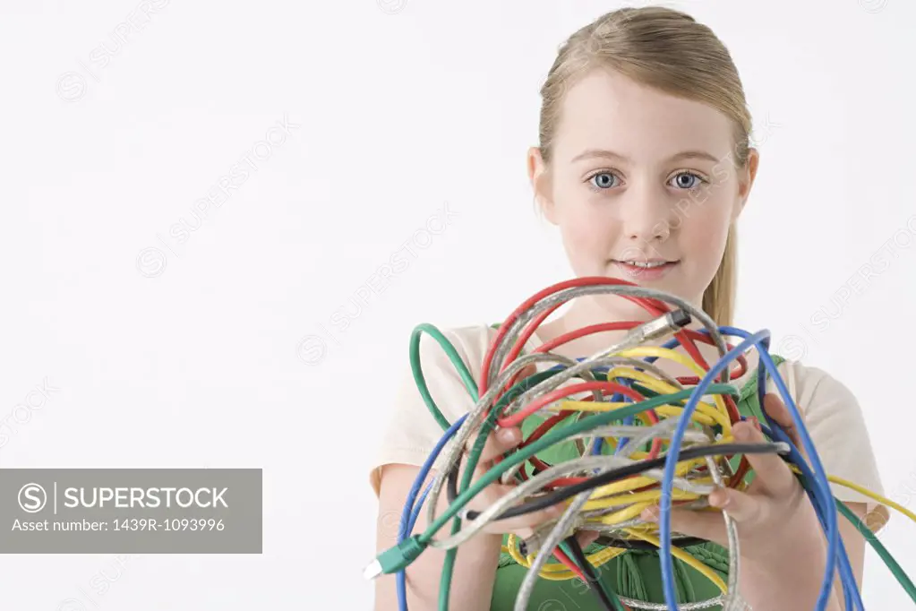 Girl holding cables