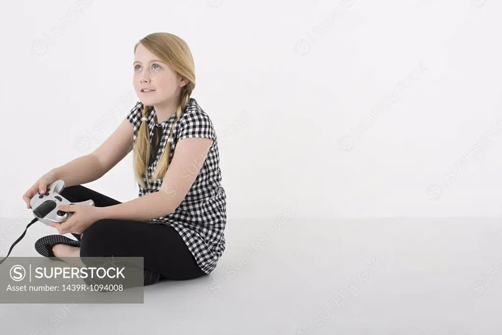 Girl with video game contoller