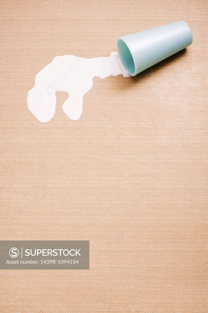A spilt cup of milk