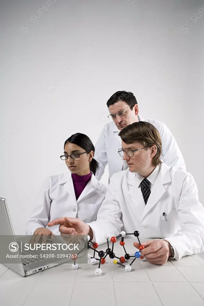 Scientists with laptop