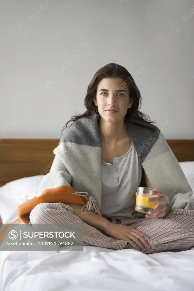 Young woman with glass of juice