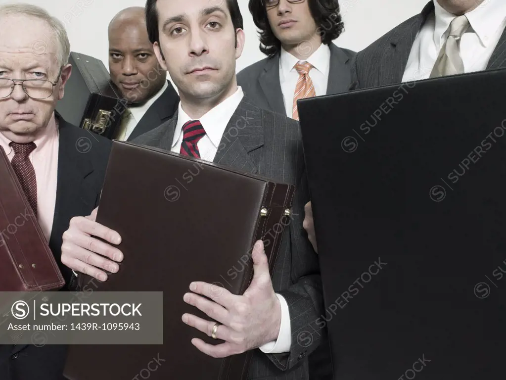 Businessmen with briefcases