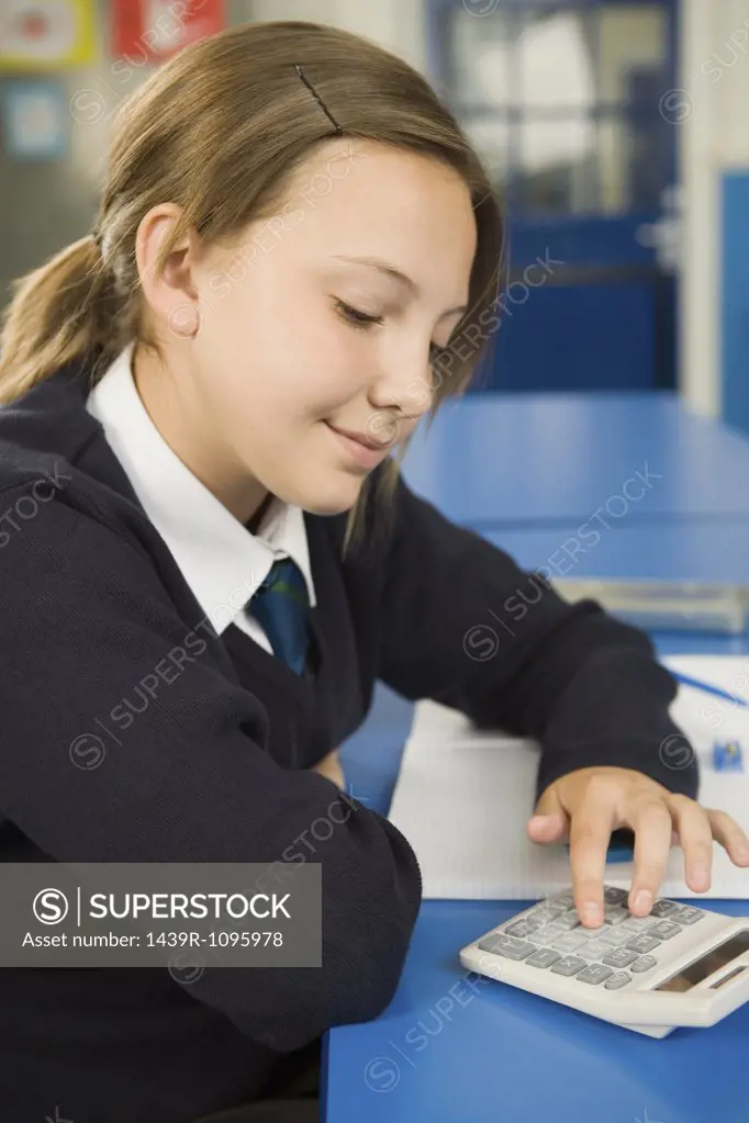 Girl using calculator