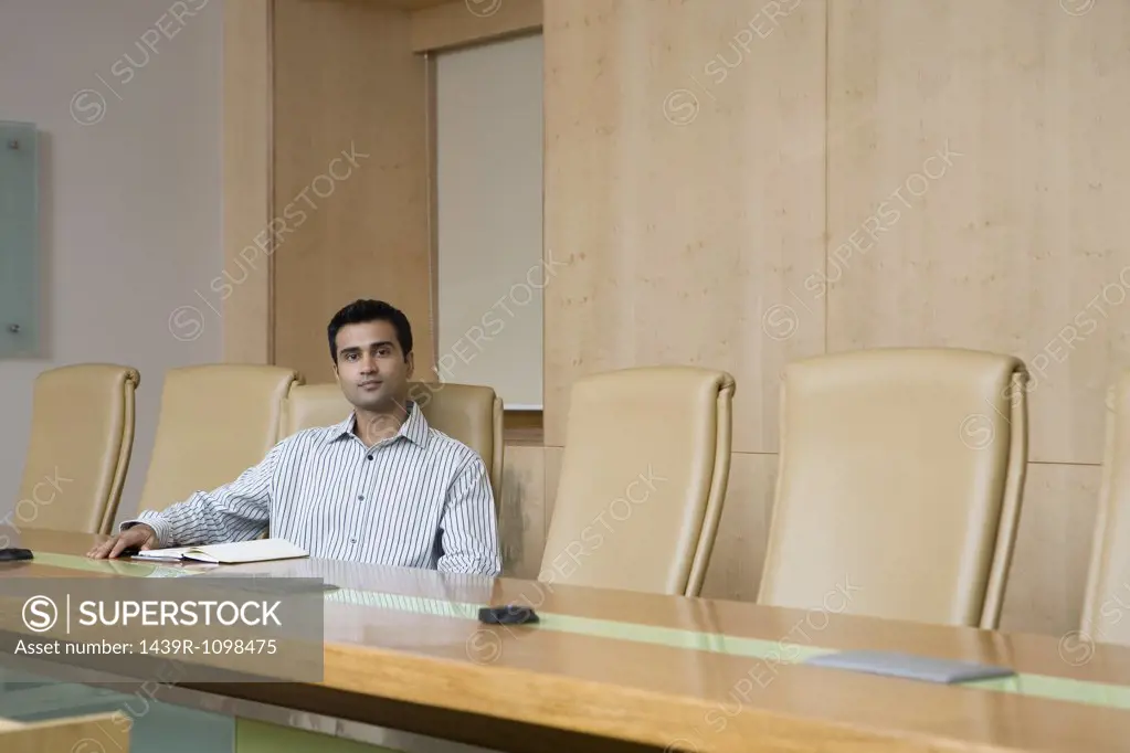 Businessman sitting in a conference room