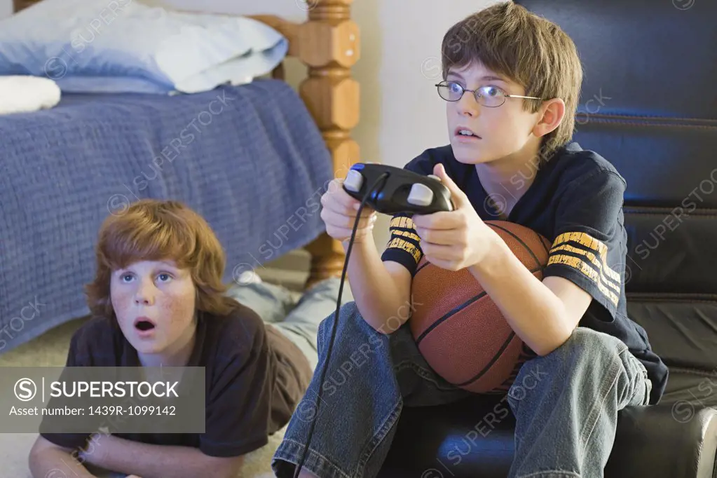Two boys playing a computer game