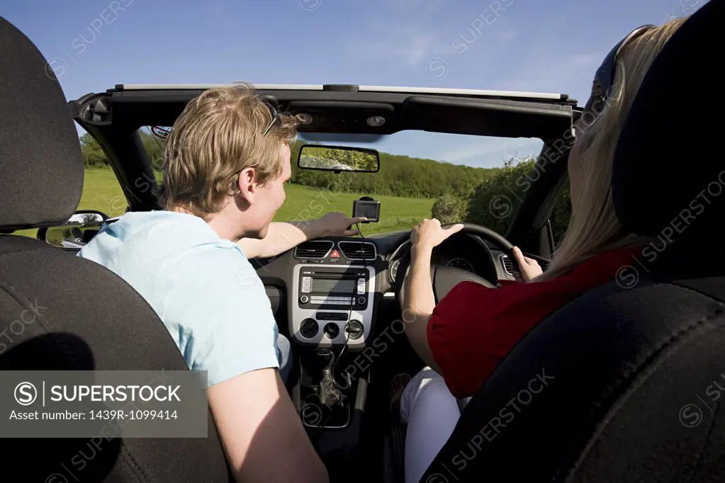 A couple driving