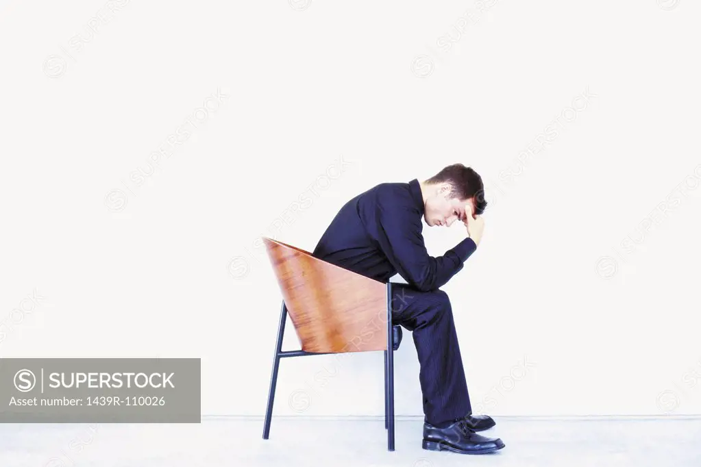 Man thinking in chair