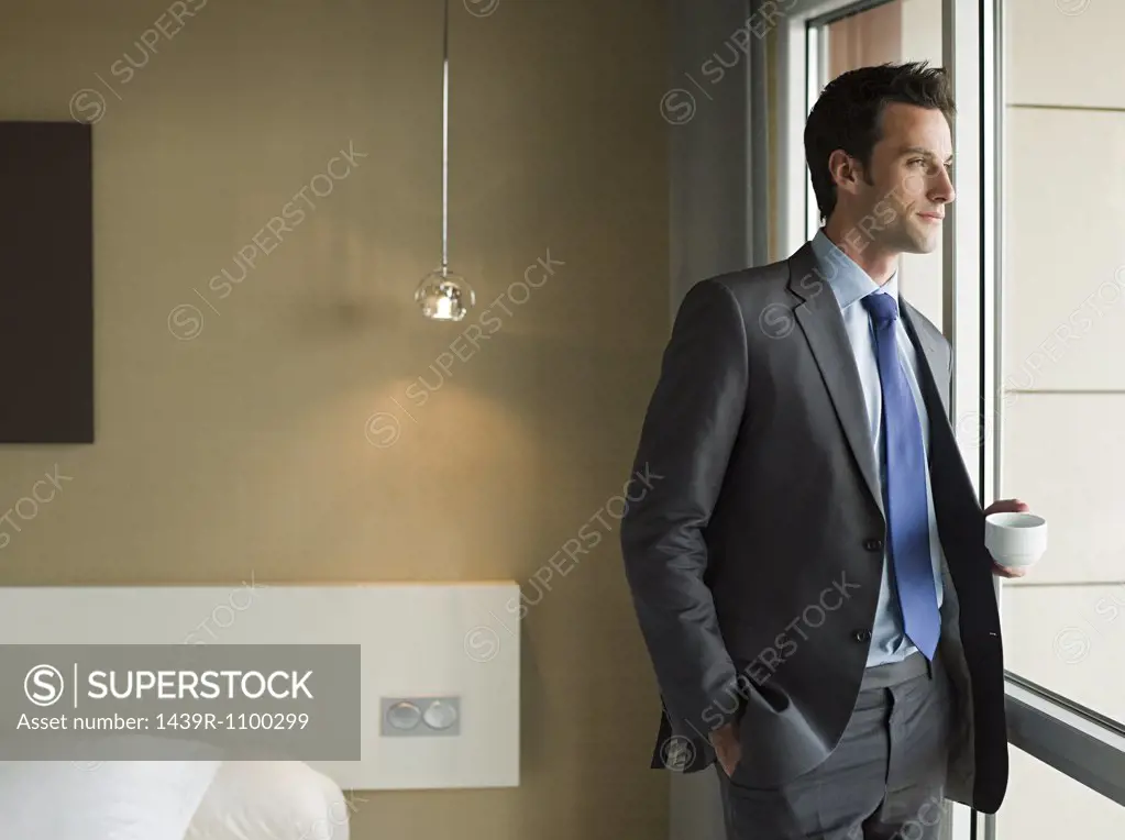 A businessman looking out of a window