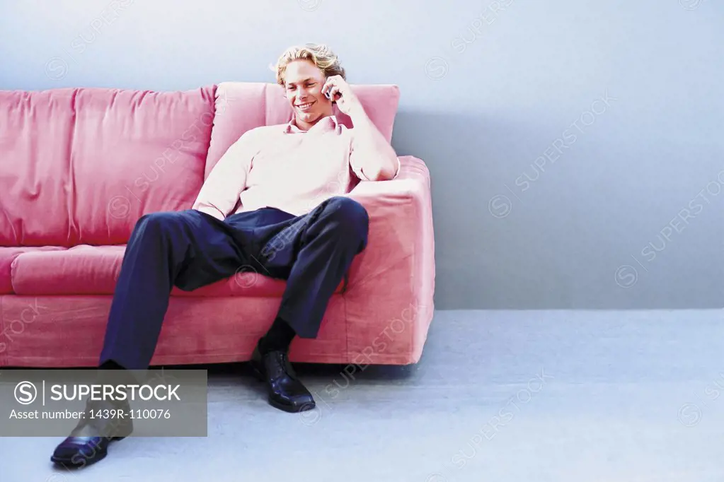 Man sitting on sofa
