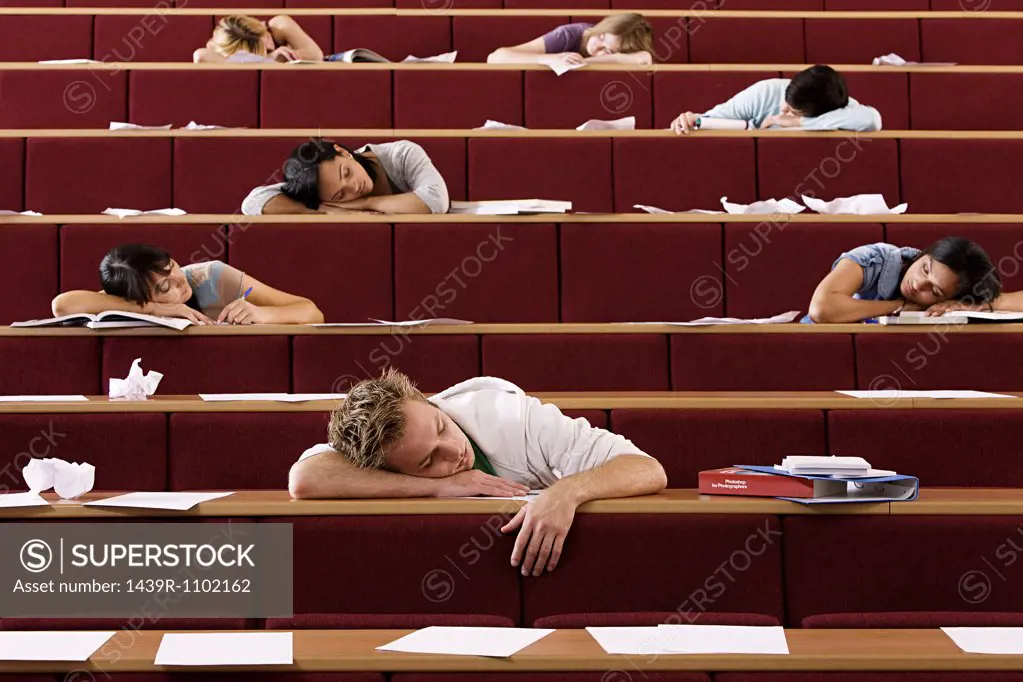 Students sleeping in lecture theatre
