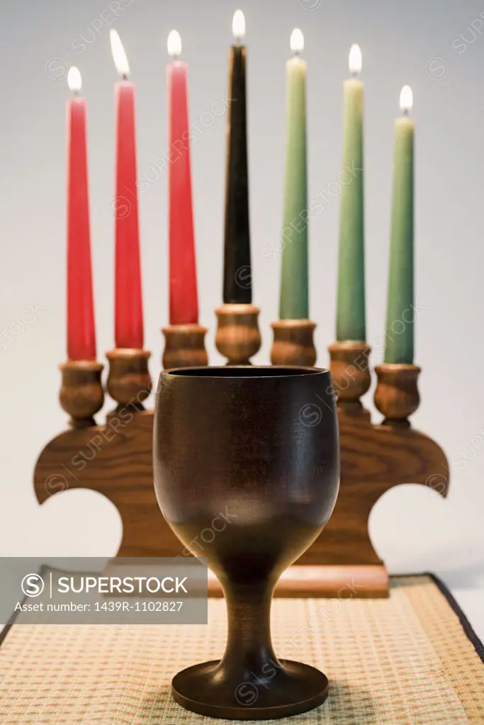 Kwanzaa candles and cup