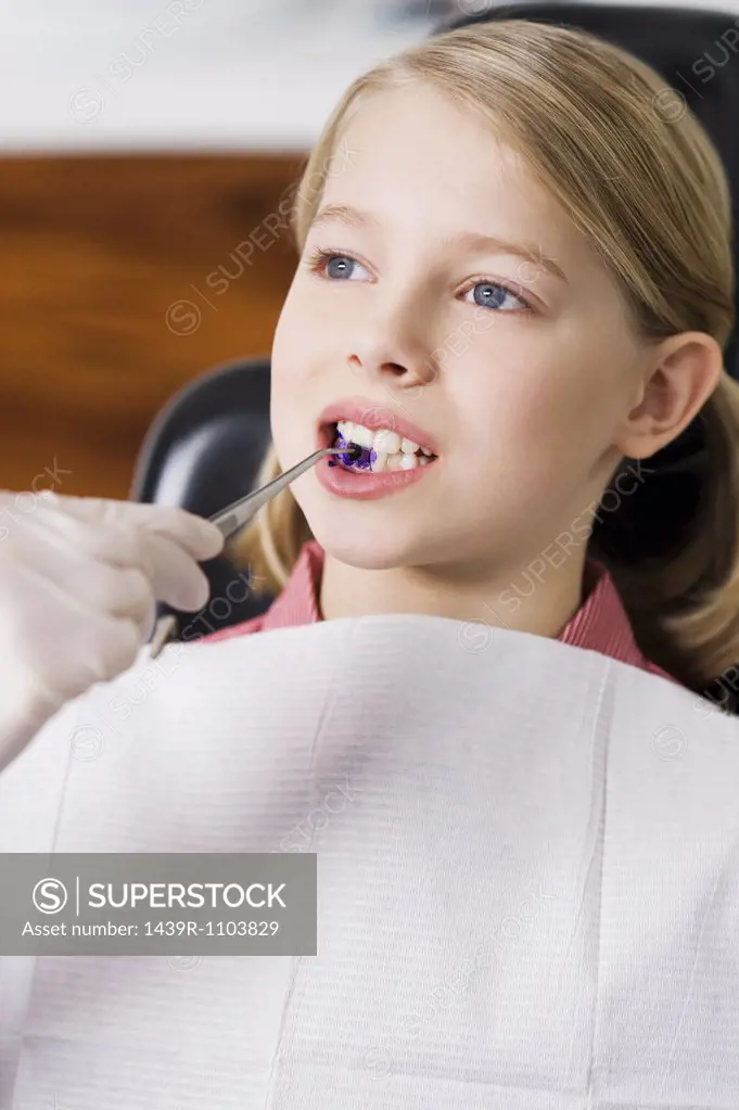 Girl at dentists office
