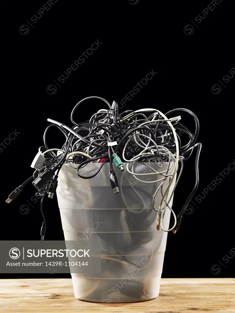 Computer cables in a waste bin