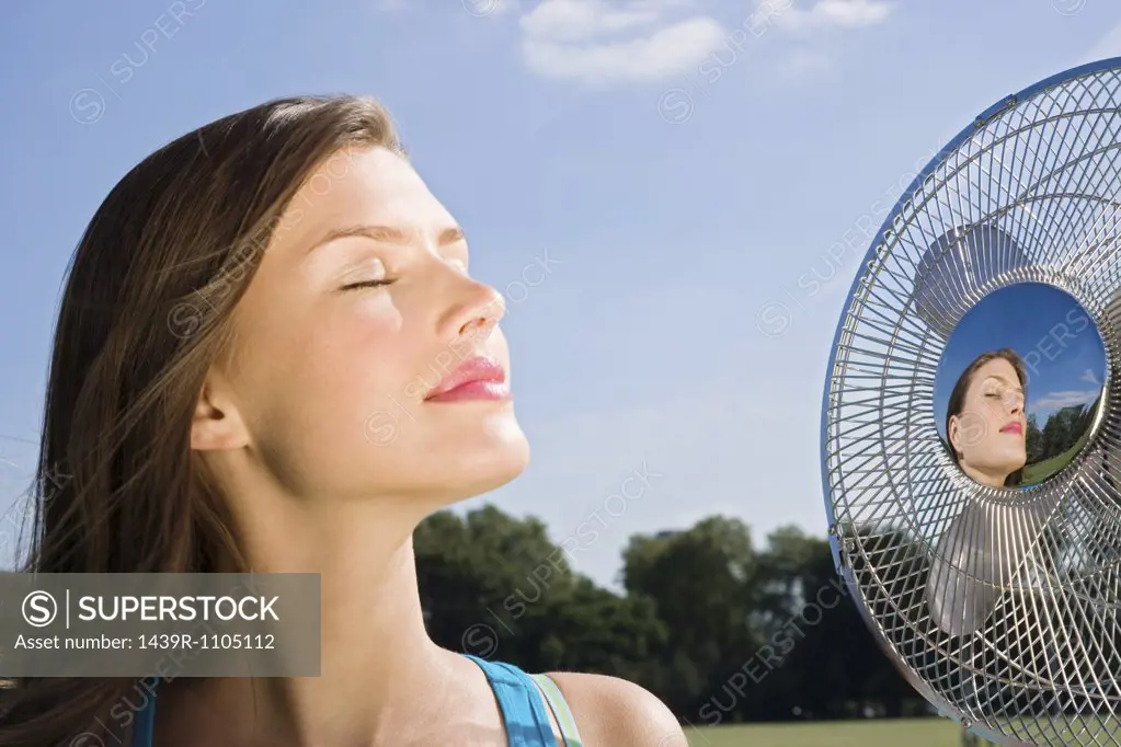 Young woman with fan