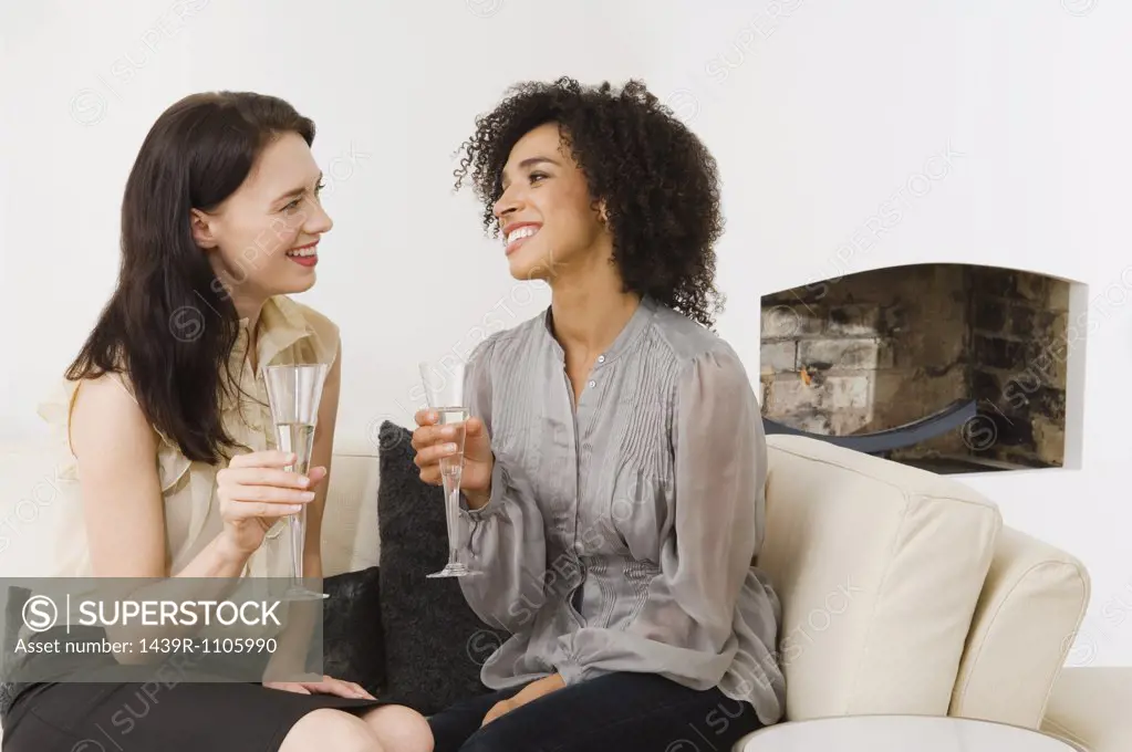 Two women having champagne