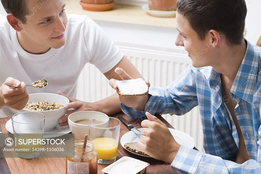 A gay couple having breakfast