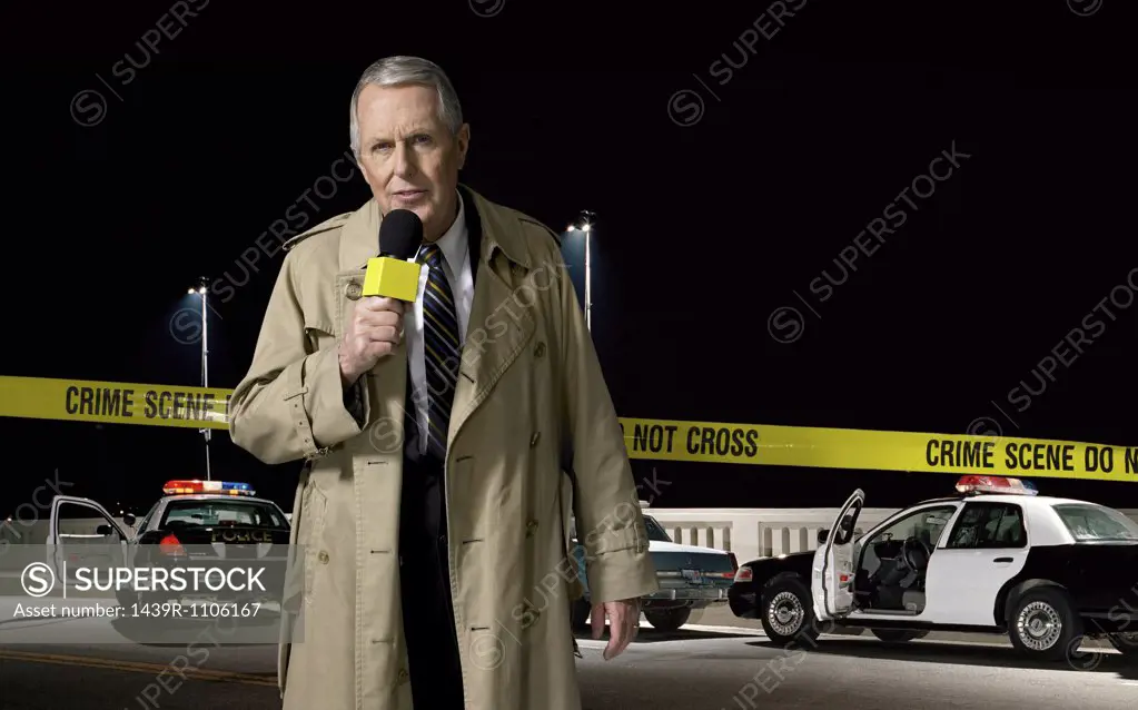 News presenter at crime scene