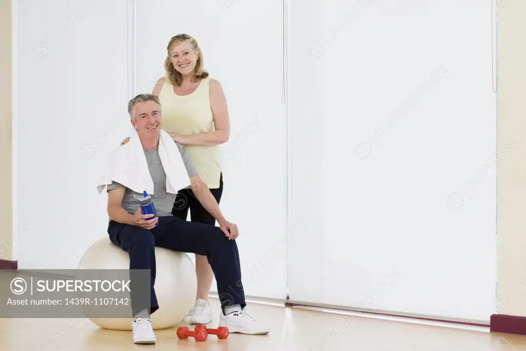 Portrait of a couple in a gym