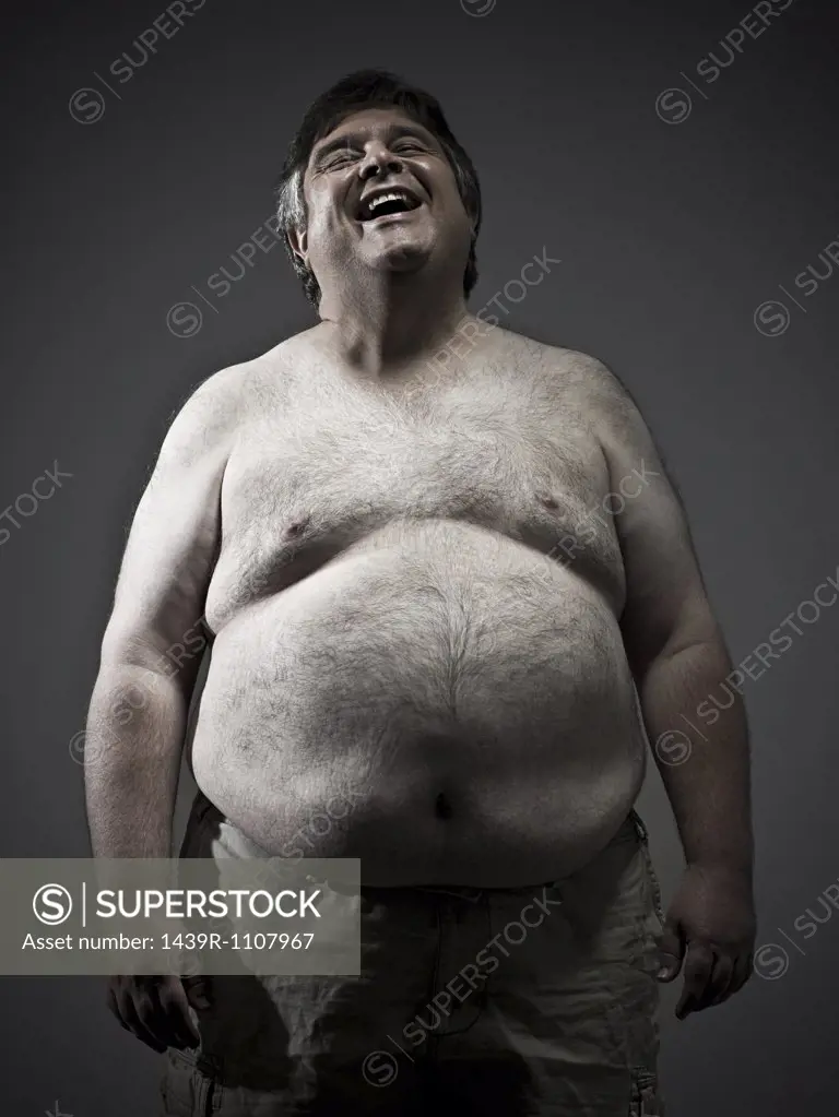 Overweight man laughing