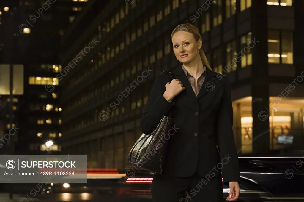 Businesswoman at night