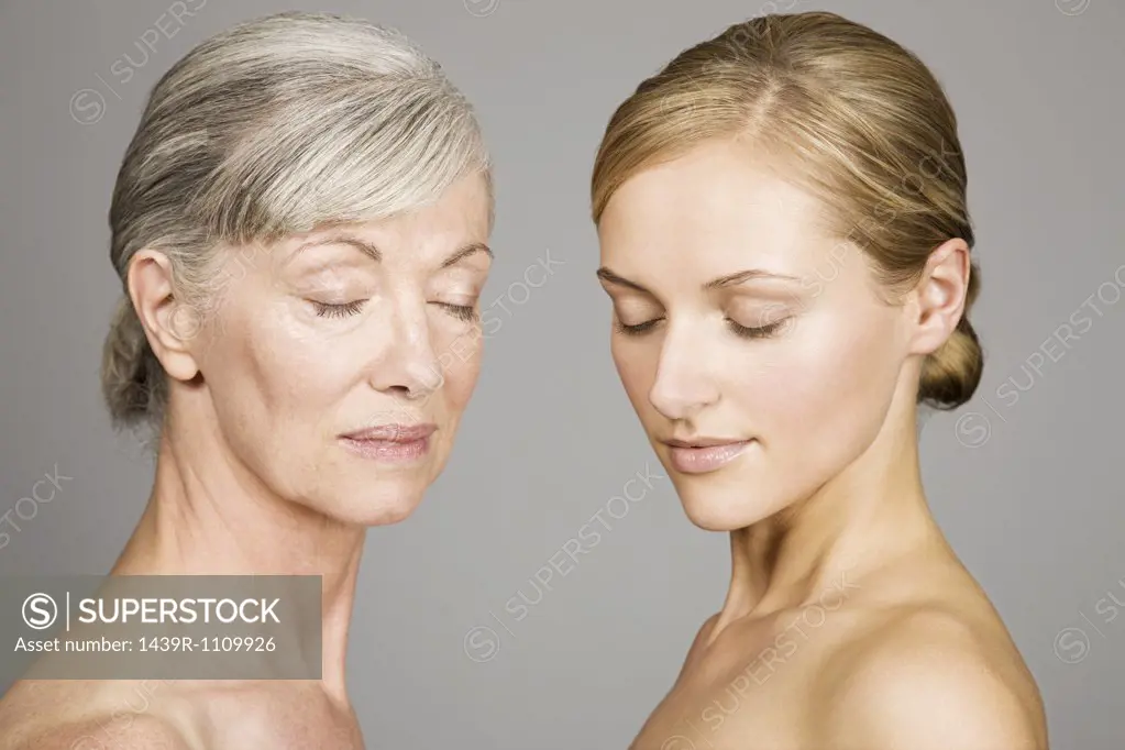 Young and senior women with eyes closed