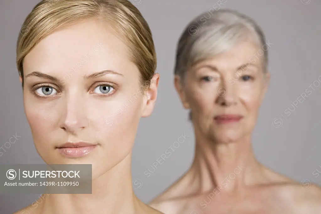 Faces of young and senior women