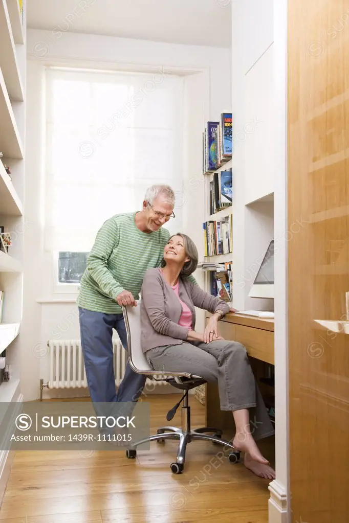 Mature couple using a computer