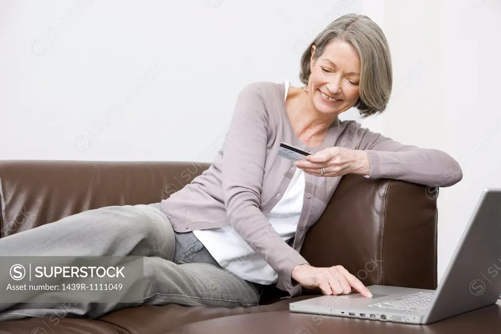 Mature woman using internet banking