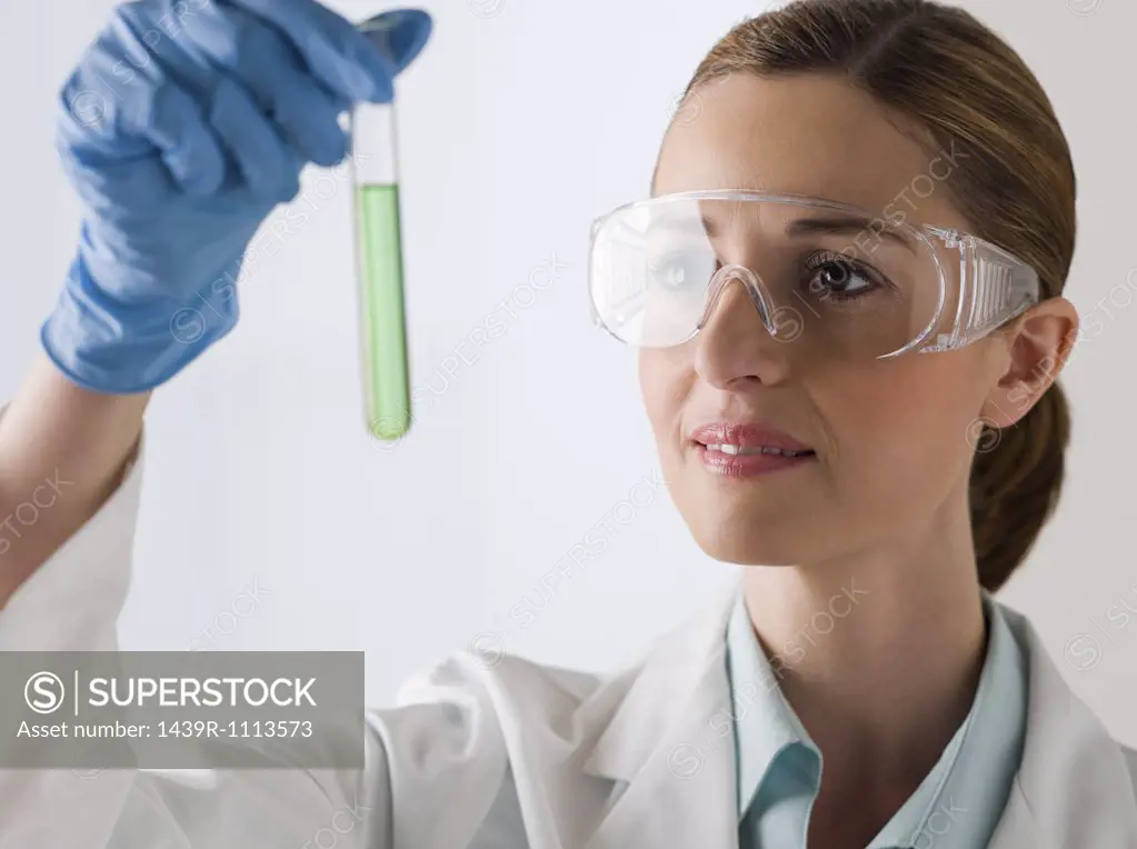 Female scientist holding a test tube