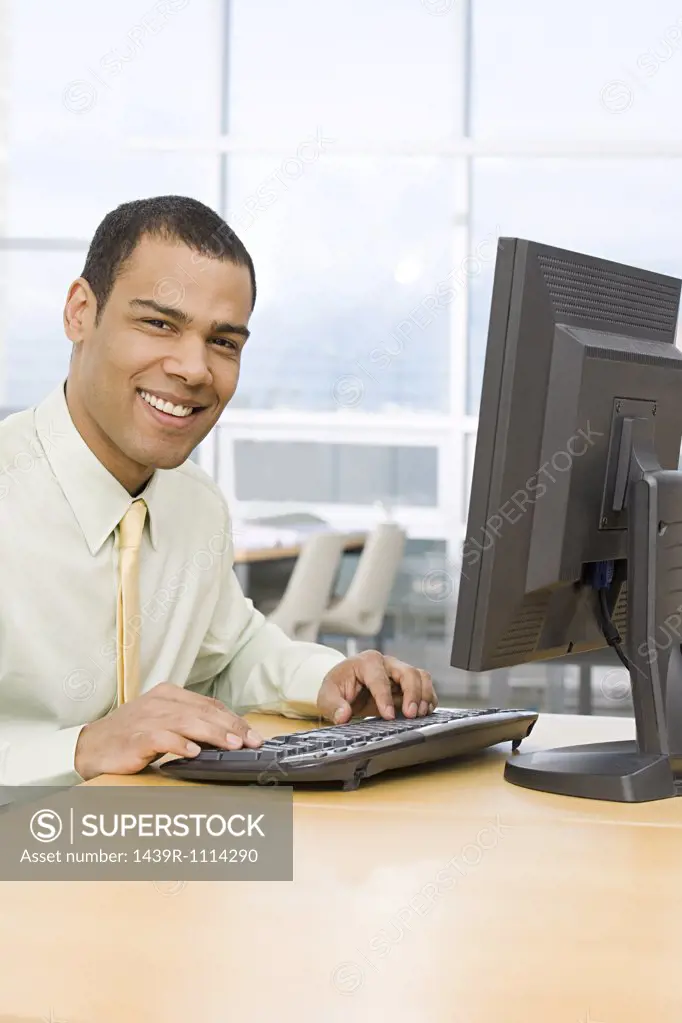 Male office worker at desk