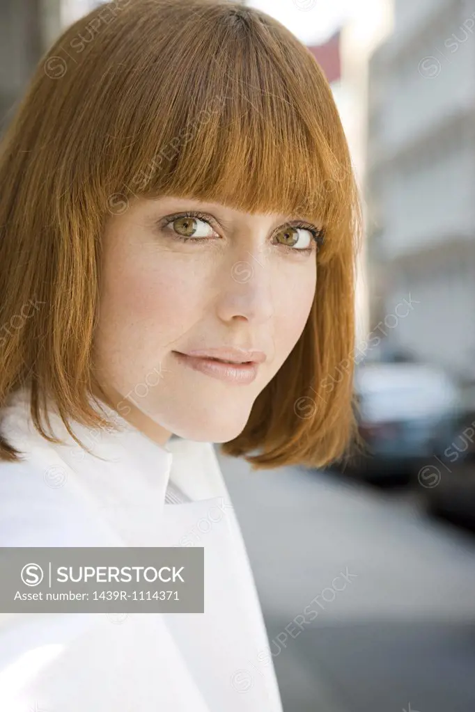 Portrait of a ginger haired woman