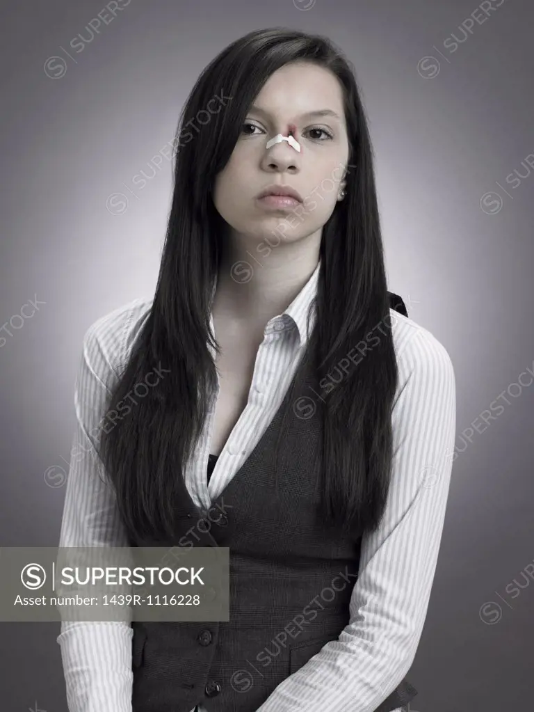 Girl with injured nose