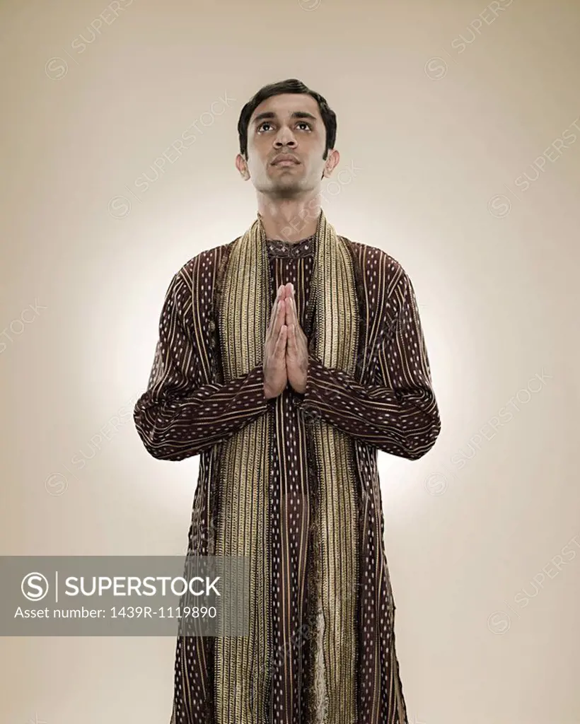 A hindu man praying