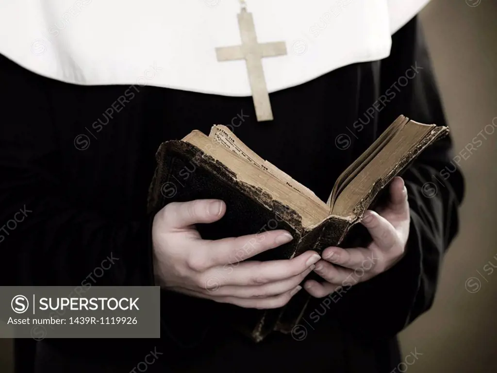 A nun holding a bible